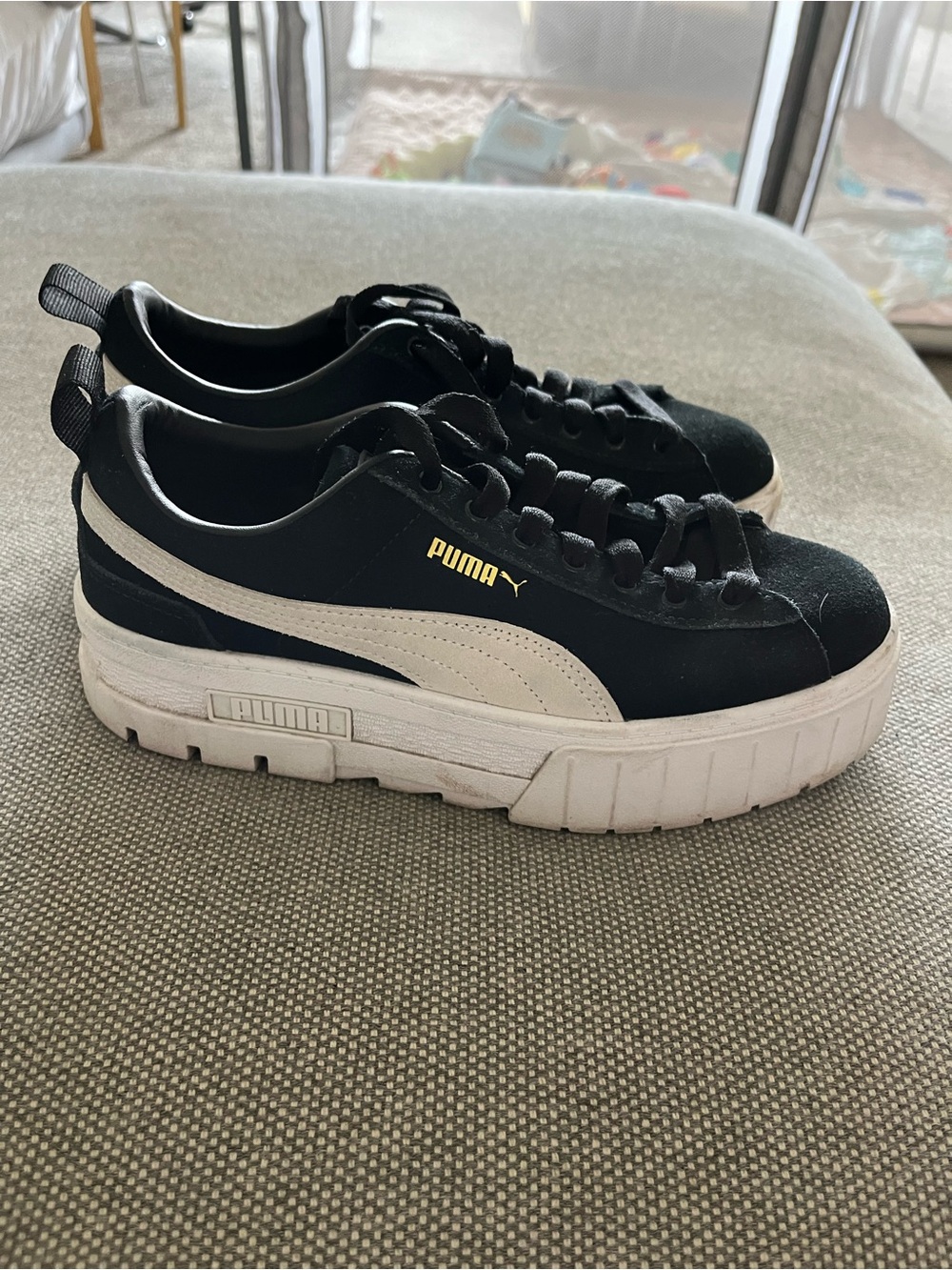 Puma Black Suede Sneakers with White Sole and Gold Logo